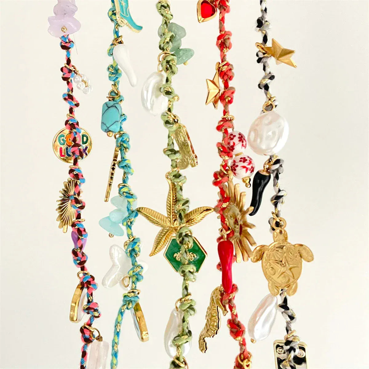 Collier avec Plusieurs Pendentifs