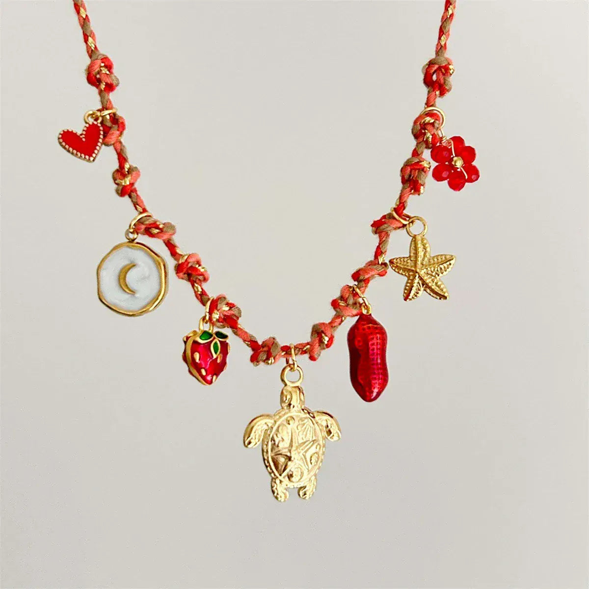 Collier avec Plusieurs Pendentifs