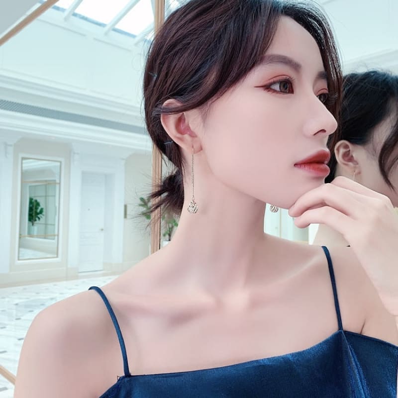 Boucle d'oreille chaine cage dorée