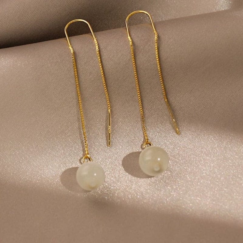 Boucle d&#39;oreille chaine traversante avec perle