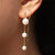 Boucle d'oreille chaine traversante perles