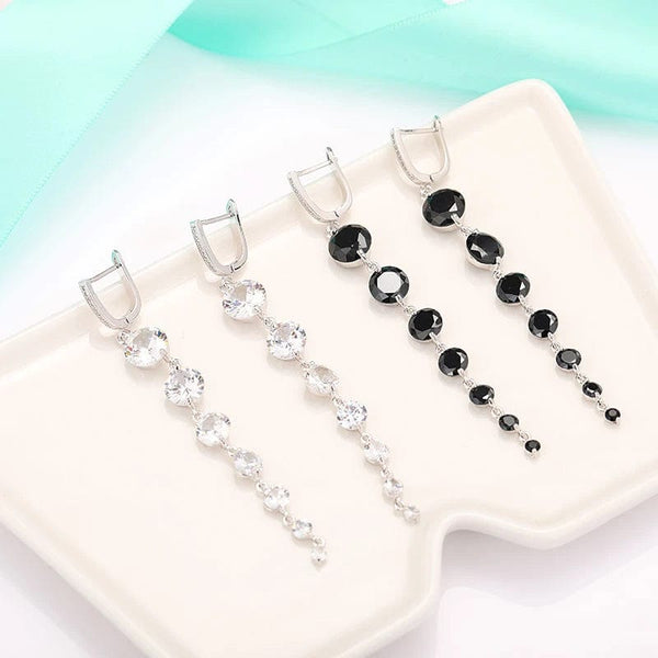 Boucle D'oreille Pendante Argentée Vieillie Avec Pierre Noire Centrale - Occasion Bon état