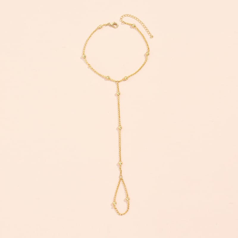 Chaine de main dorée